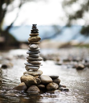 A stack of rocks in the river.
